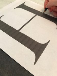 Tracing the letters onto board