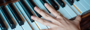 fingers on piano